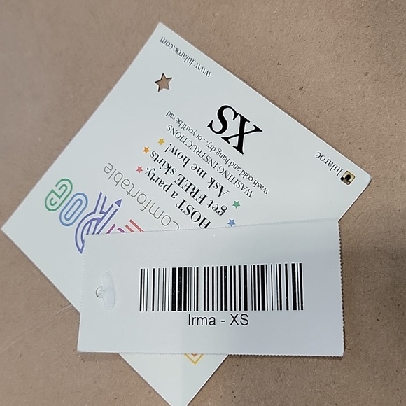 LuLaRoe Size XS Black with Daisy Pattern "IRMA" Tunic Top, NEW with Tag - Picture 12 of 13